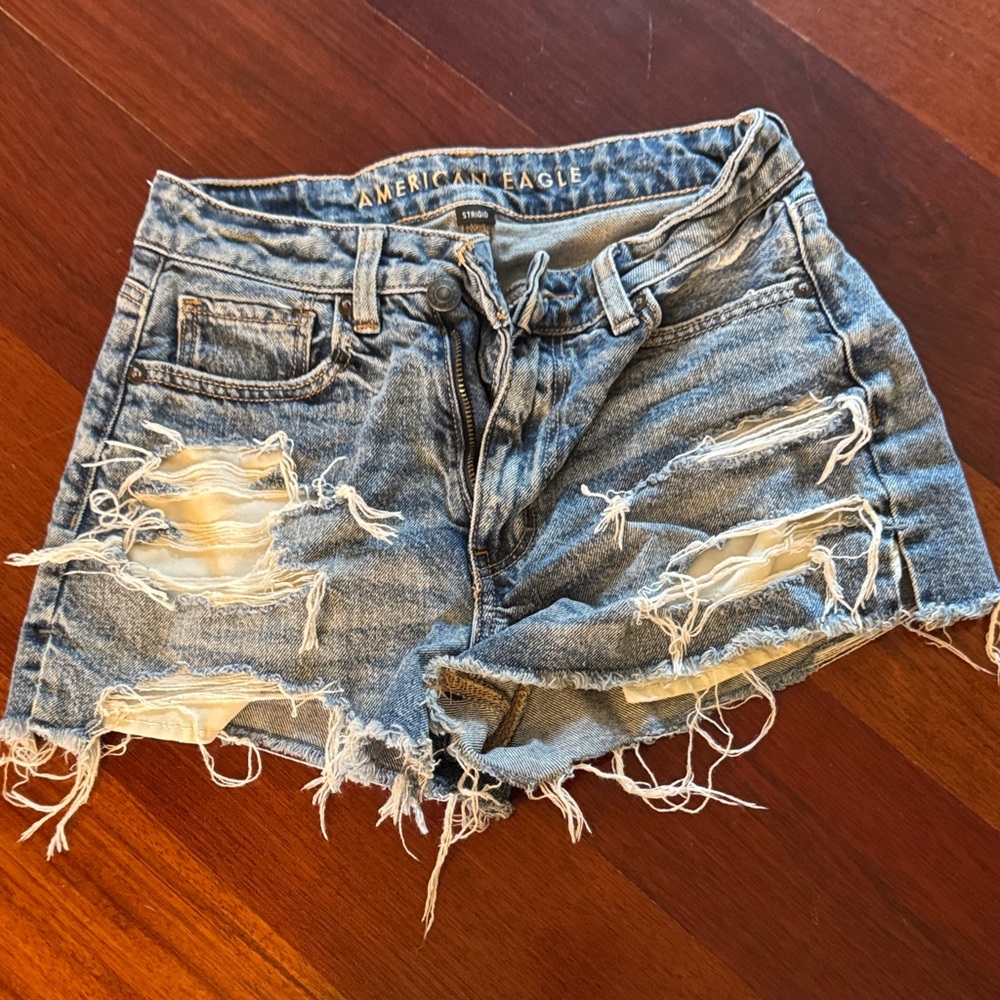 American Eagle Outfitters Ripped Light Blue Jean Shorts